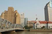 The Broadway Mansions with Waibaidu Bridge and the Russia Consulate of Shanghai
