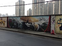 Graffiti on a wall on Moganshan Road near M50 Art district in Putuo, Shanghai